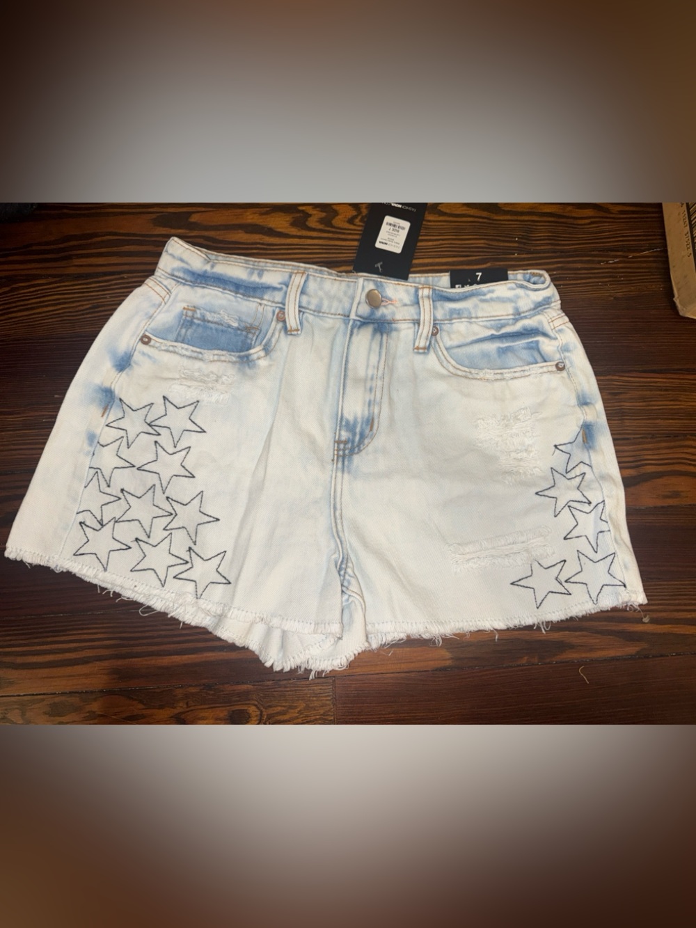 Fashion Nova Light Wash White Denim Star-Print Shorts